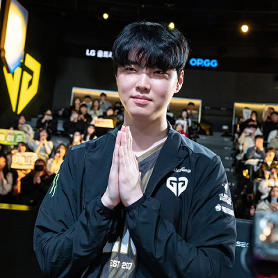 Lee Sang Hyeok, known as Faker, competing in a high-stakes League of Legends tournament, showcasing his legendary skills and dominance in the eSports scene.